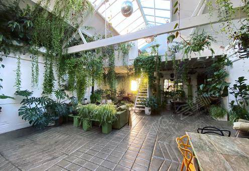 Plant filled Victorian stable in old Tram Depot